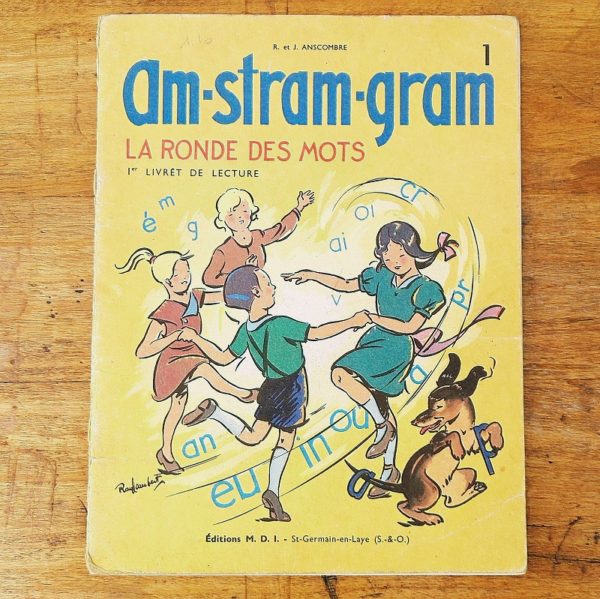 Méthode de lecture "Am-stram-gram" la ronde des mots par Anscombre et llustré par Ray Lambert. aux éditions MDI, datant de 1966.