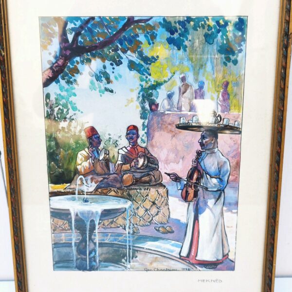 Aquarelle intitulée " Meknès" rehaussée de gouache représentant des musiciens marocains dans un jardin de Meknès qui vont prendre le thé à la menthe. Signé sur le bas Géo Chantriau, et daté de 1932. Petites taches d'humidité sans gravité et des petites rousseurs. Très bon état. Dimensions : 33 x 25,5 cm