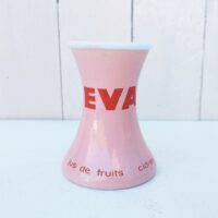 Porte paille publicitaire pour la marque de jus de fruit Eva En opaline rose. Excellent état. Hauteur : 10,5 cm