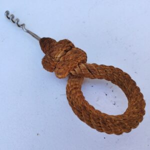 Tire bouchon corde par Audoux Minet, datant des années 60. Légèrement tordu , corde patinée. Bon état général Longueur : 22 cm