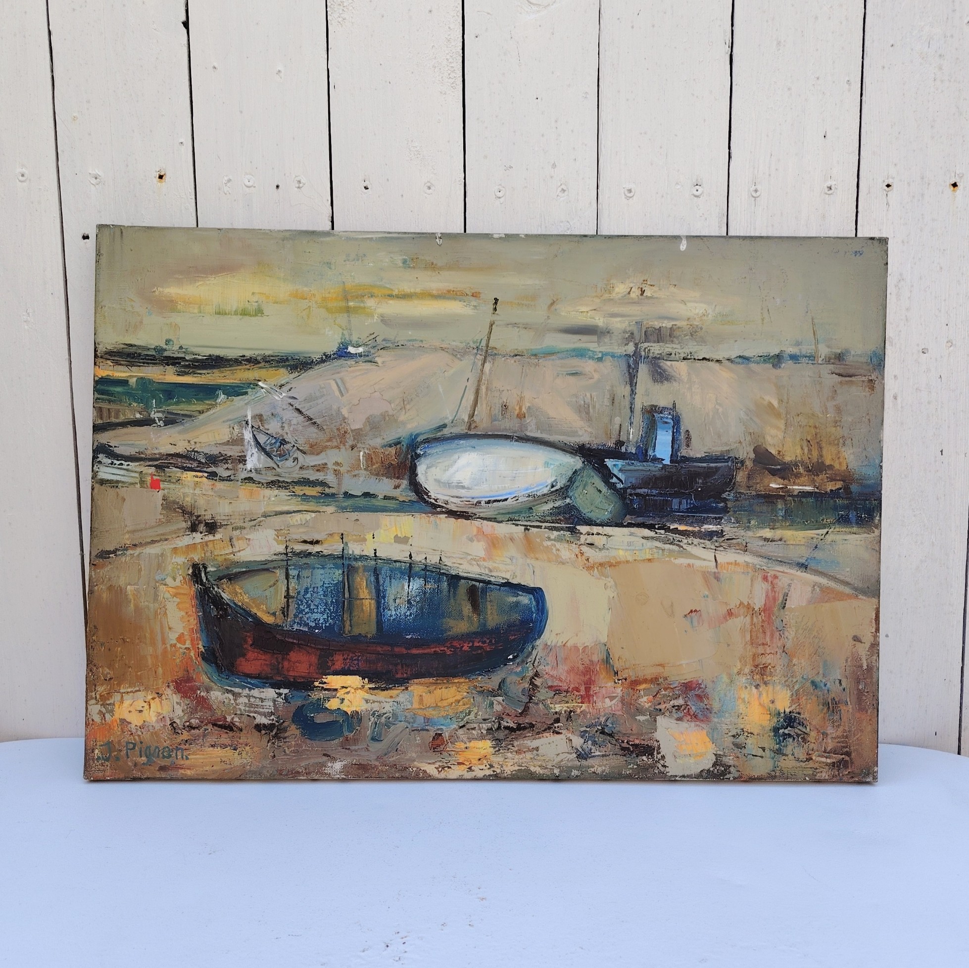 Tableau, Peinture acrylique sur toile représentant des bateaux en cale sèche pendant la marée basse. Signé Pignon. Un manque de matière au niveau du deuxième bateau en arrière plan Bon état. Dimensions : 54,5 x 38 cm
