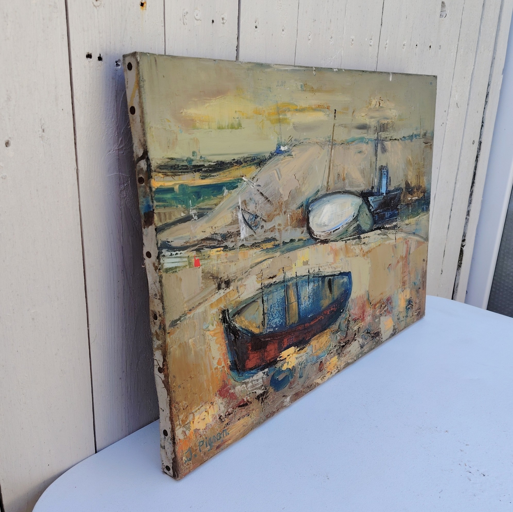 Tableau, Peinture acrylique sur toile représentant des bateaux en cale sèche pendant la marée basse. Signé Pignon. Un manque de matière au niveau du deuxième bateau en arrière plan Bon état. Dimensions : 54,5 x 38 cm