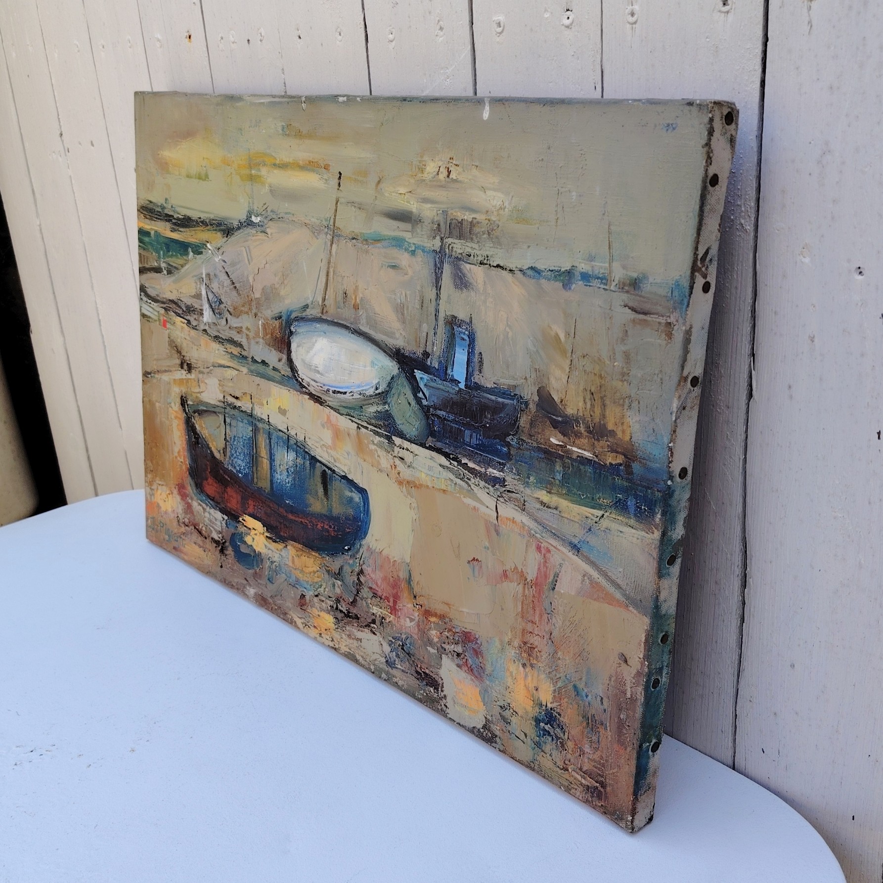 Tableau, Peinture acrylique sur toile représentant des bateaux en cale sèche pendant la marée basse. Signé Pignon. Un manque de matière au niveau du deuxième bateau en arrière plan Bon état. Dimensions : 54,5 x 38 cm