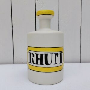 Bouteille ou flacon de Rhum  en céramique, par Elchinger datant des années 60, Non signée, un petit sur le dessous non visible un fois posée.  Bon état. Hauteur bouteille : 18 cm
