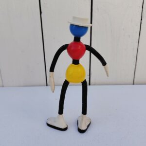 Ancienne figurine publicitaire pour une entreprise allemande des années 60. Figurine flexible. Couleurs très vives. Très bon état Hauteur : 14,5 cm