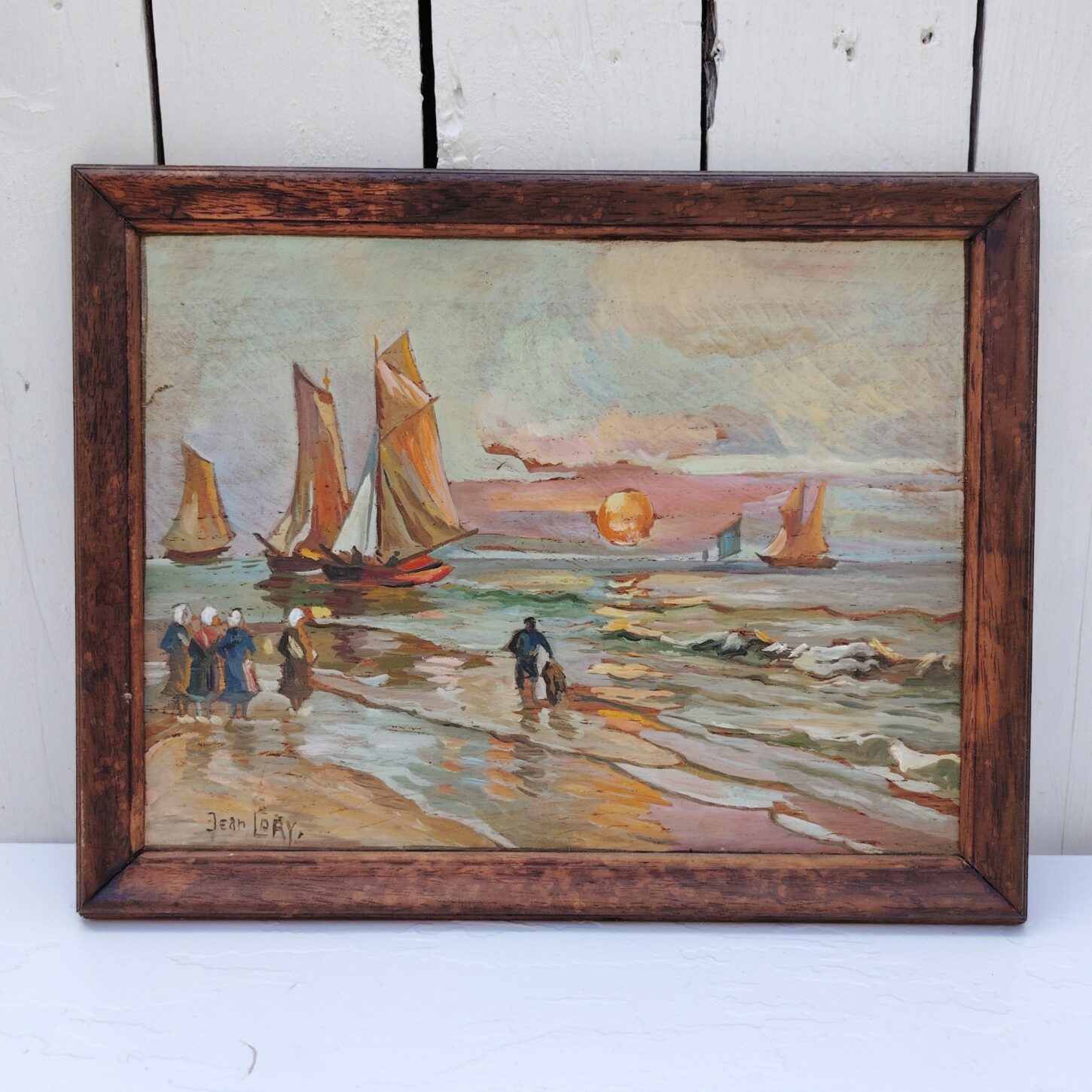 Gouache sur panneau isorel, représentant un retour de pêche au coucher du soleil, Situé dans le Morbihan en Bretagne. Signé Jean Lory. Encadrement bois. Bon état général Dimensions : 32 x 26 cm